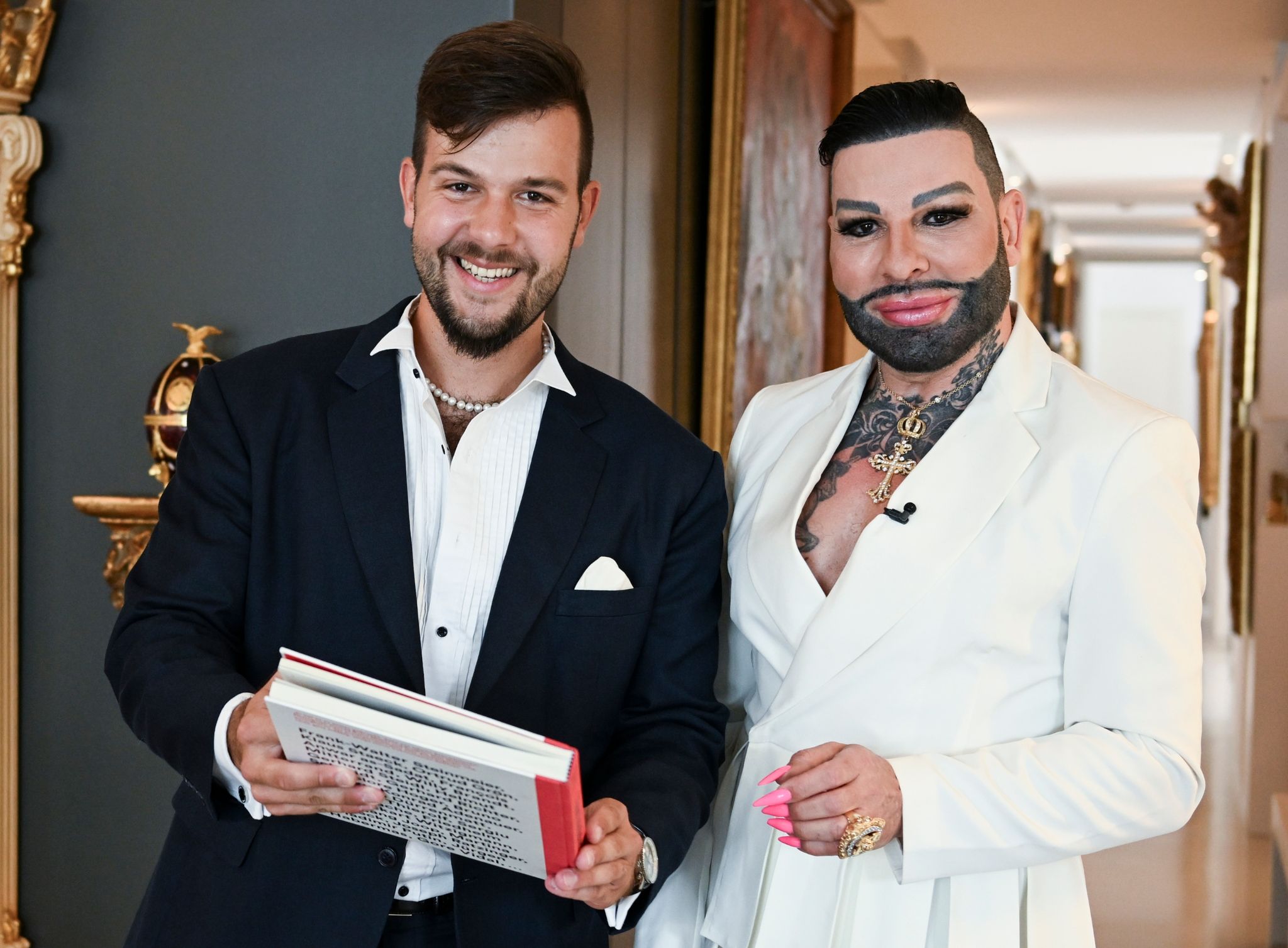 Glööckler mit neuem Freund bei Berliner Modenschau